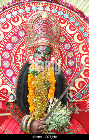 Portrait Of A Theyyam Artist With Traditional Makeup On His Face ...