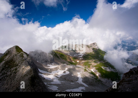 Cloudy mood in the Alpstein Range as seen from Saentis Mountain, Appenzell, Swiss Alps. Stock Photo