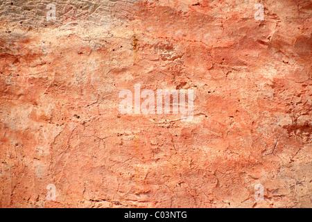 Orange painted plaster background Stock Photo