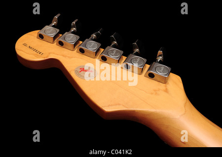 Fender American Standard Stratocaster headstock on black background Stock Photo