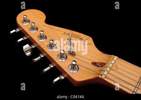 Fender American Standard Stratocaster headstock on black background Stock Photo