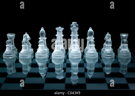 Macro shot of glass chess set against a black background Stock Photo