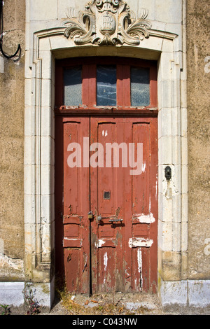 Weathered doorway in Ballee, Normandy, France Stock Photo
