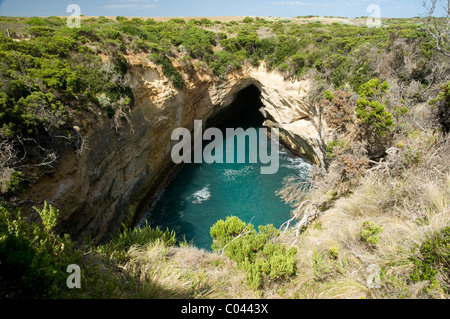 Eroded cliffs and sea caves along The Great Ocean Road, Victoria, Australia Stock Photo