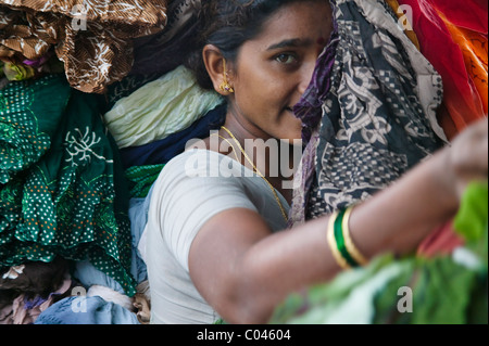 Woman in laundry factory, Bombay, India Stock Photo