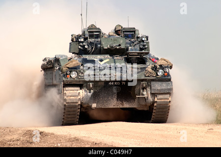A British Army Warrior Infantry Fighting Vehicle on the Salisbury Plain Military Training Area in Wiltshire, United Kingdom Stock Photo