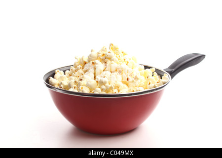 Popcorn in a wok against a white background Stock Photo