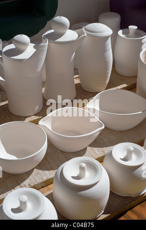 New Mexico light beams on unglazed ceramic art, at the White Oaks Pottery gallery and studio near White Oaks, New Mexico. Stock Photo