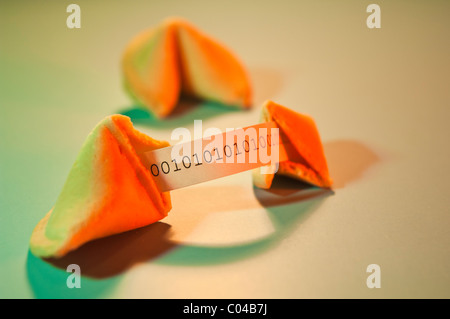 Fortune cookie with message in binary code Stock Photo