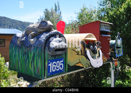 Decorative letter boxes in Okiwa Bay, Queen Charlotte Sound, Marlborough Sounds, Marlborough Region, South Island, New Zealand Stock Photo