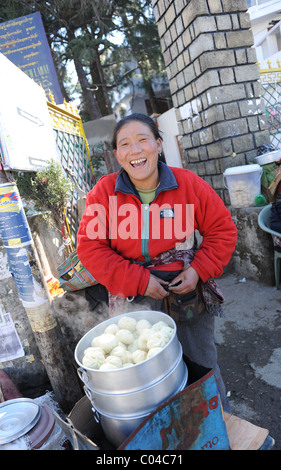 Woman selling MoMo's at McLeod Gange, India Stock Photo