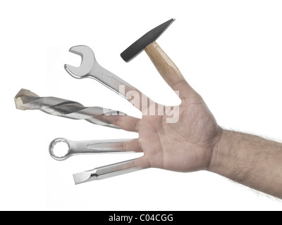 Handyman hand full of tools on white background Stock Photo