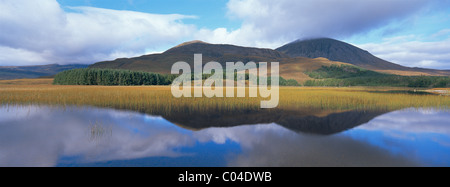 Scotland Isle of Skye Loch Cill Chriosd looking across to Beinn Dearg Bheag 582mtr Beinn Dearg Mhor 709mts and Beinn na Caillich Stock Photo