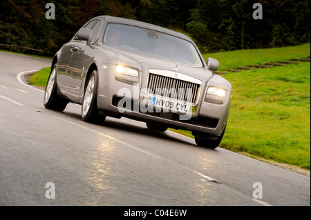 A Rolls Royce Phantom being driven in East Sussex, UK Stock Photo