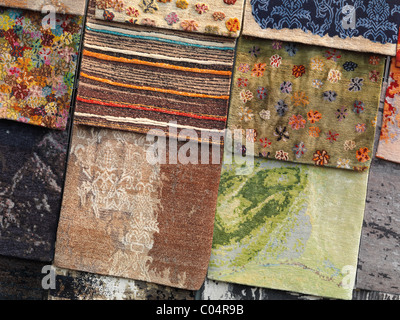 Colorful rugs on a display
