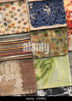 Colorful rugs on a display