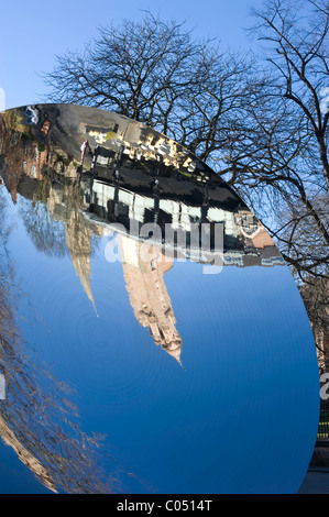 Anish Kapoor's Sky Mirror next to the Nottingham Playhouse on a sunny winter's day with a clear blue sky. Stock Photo