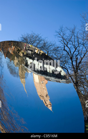 Anish Kapoor's Sky Mirror next to the Nottingham Playhouse on a sunny winter's day with a clear blue sky. Stock Photo