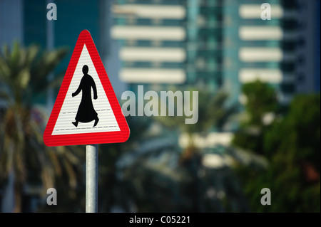 Pedestrian Crossing Sign on Al Corniche Street, Doha, Qatar showing a figure in arabic dress Stock Photo