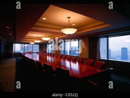 Elaborate board room table and chairs in a corporate office Stock Photo
