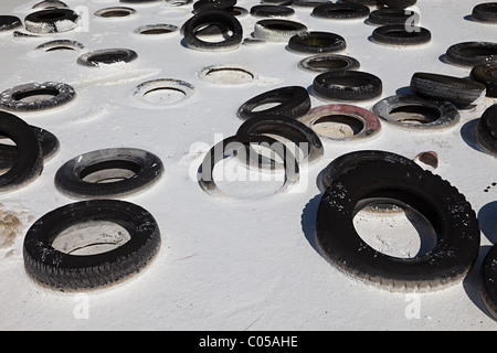 Dumped car tyres set in tufa water pollution in Brook Bottom Springs ...