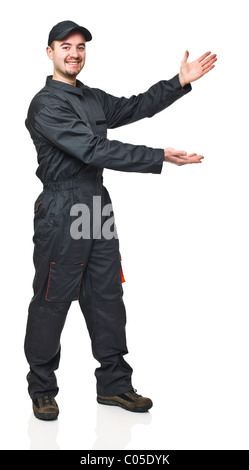 smiling young worker in show arms gesture on white background Stock Photo