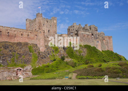Bamburgh Castle, built on a basalt outcrop rebuilt by the Normans in the 9th century in Bamburgh in Northumbria Stock Photo