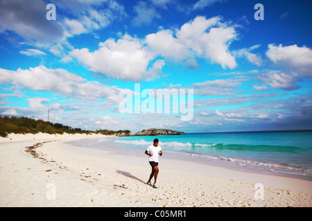 Running in Bermuda Horseshoe Bay Beach Stock Photo