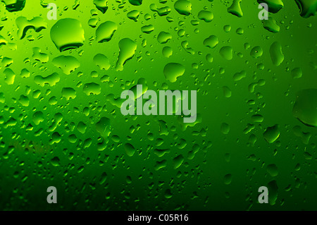 water drops on green glass Stock Photo