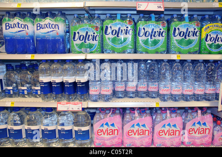 Bottled water on a shelf in a supermarket in England Stock Photo