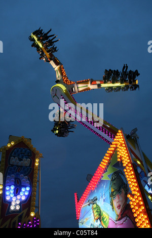 Thrill seekers on a ride at the Sydney Royal Easter Show, Sydney, New South Wales, Australia. Stock Photo