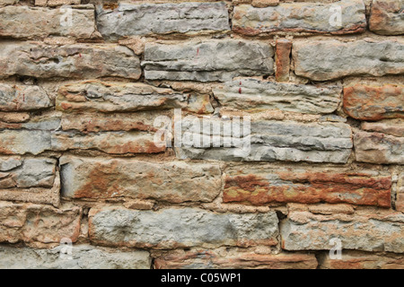 Stone Wall Texture. Spider webs with dried grass visible at 100 percent. Stock Photo