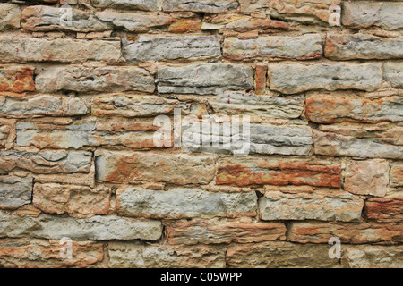 Stone Wall Texture. Spider webs with dried grass visible at 100 percent. Stock Photo