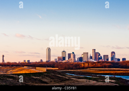 Wide angle view of the Dallas, Texas skyline from the south at the I-45 Interstate bridge over the Trinity River. Stock Photo