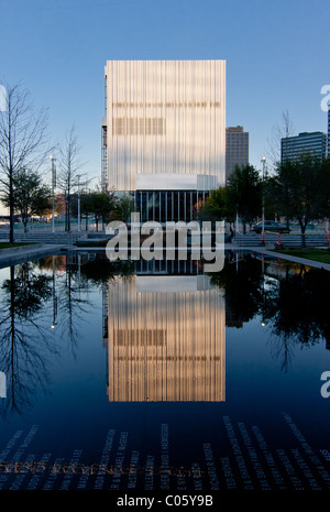 The Wyly Theatre, part of AT&T Performing Arts Center, in Dallas reflected in the reflecting pool near the Winspear Opera House. Stock Photo