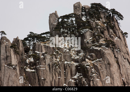 Clear view the Huangshan Mountain in winter showing the mountains and trees are covered with snow drops. Stock Photo