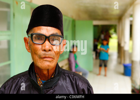 Old man, portrait, hospital, Balinge, Batak region, Sumatra island, Indonesia, Asia Stock Photo