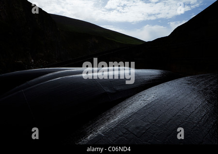 Upturned Curraghs in Dunquin Harbour, Dingle Peninsula, County Kerry, Ireland Stock Photo