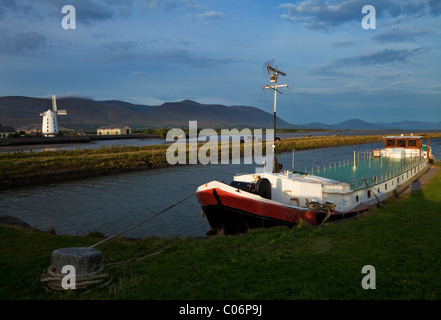 Blennerville Windmill and Traditional Barge on the River Lee, Near Tralee, County Kerry, Ireland Stock Photo