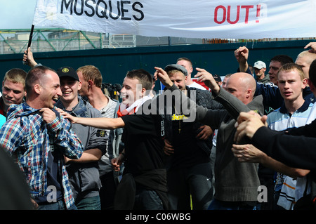 EDL supporters sing England songs at the UAF crowd Stock Photo