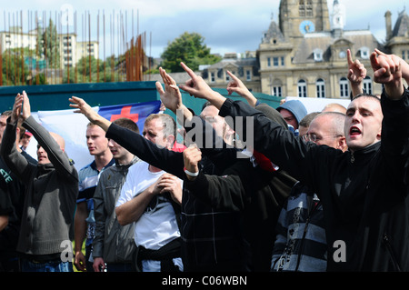 EDL supporters sing England songs at the UAF crowd Stock Photo