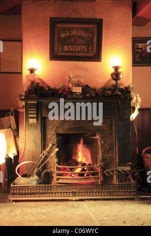 A peat fire in a traditional Irish pub, Co. Clare, Rep of Ireland. Stock Photo