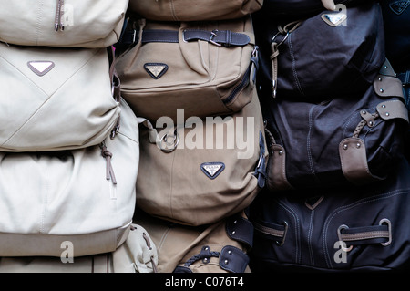 fake designer pirate pirated luxury goods on sale stall petaling street  chinatown kuala lumpur malaysia louis vuitton bags Stock Photo - Alamy