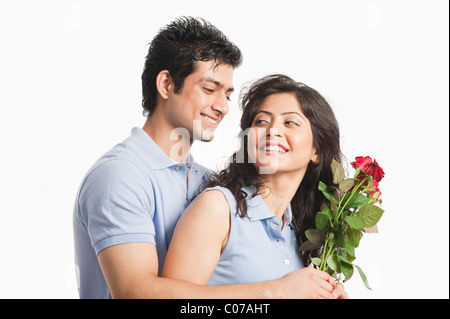 Red Roses Couple Romantic couple with red roses Stock Photo - Alamy