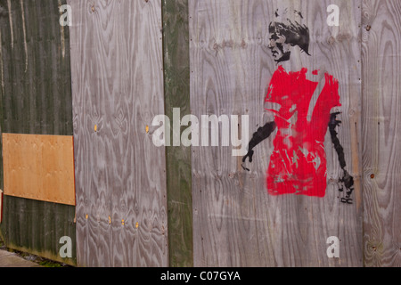 Grafitti of Liverpool caretaker manager Kenny Dalglish in the style of Banksy Stock Photo