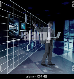 Businessman working on a virtual screen Stock Photo