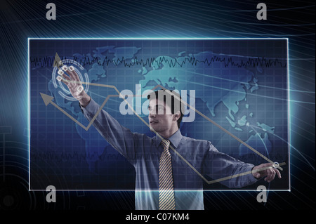 Businessman using a virtual screen Stock Photo