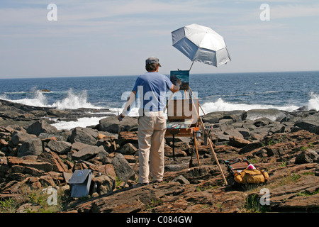 Artist, art class painting, easel, seascape, artist colony, Monhegan Island, Maine coast, New England, USA Stock Photo