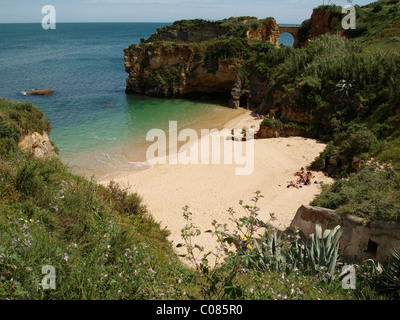 Typical steep coast, cliffs, and Praia dos Estudantes beach near Lagos, Algarve, Portugal, Europe Stock Photo