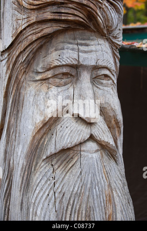 A statue of and old man with a long beard on the side of the Stock ...